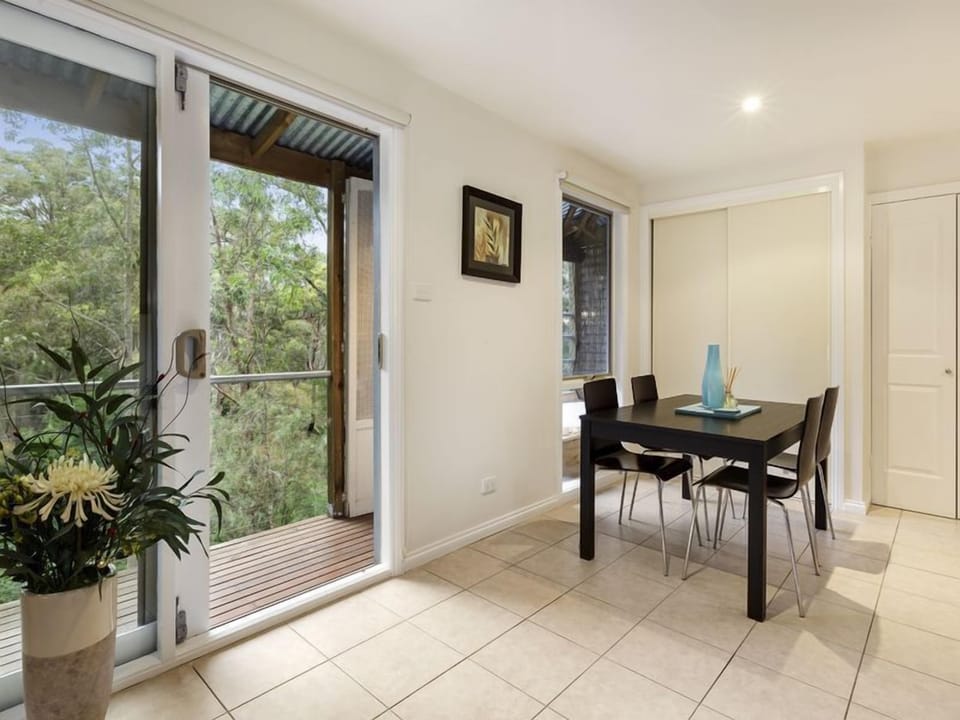 Open plan living space leading onto the back deck.