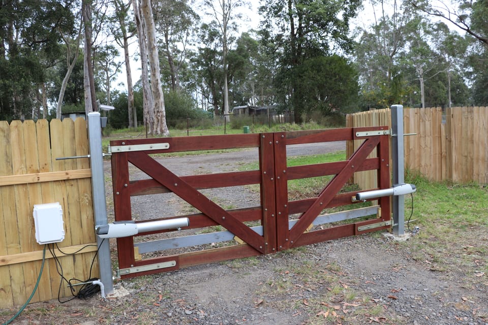 view from inside property of our electronic gate: button to open is on left post