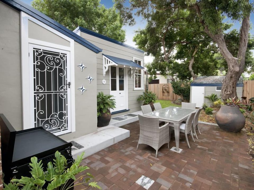 Enjoy the private outdoor dining area and BBQ & Hot/Cold Outdoor Shower.