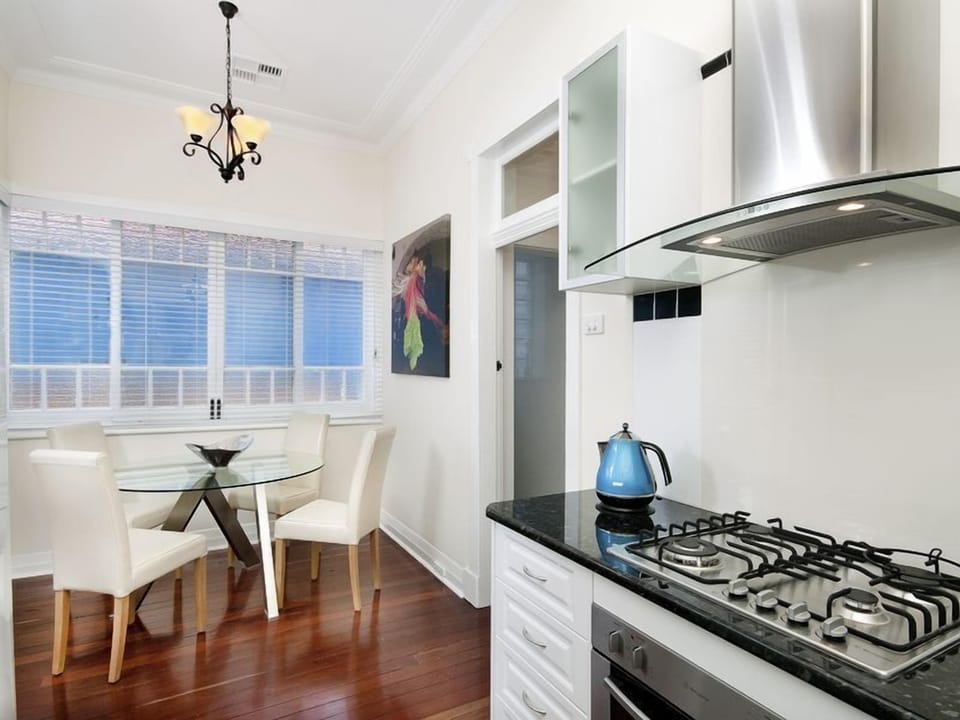 Gourmet kitchen with gas cooktop, large Refrigerator, Nespresso Coffee.