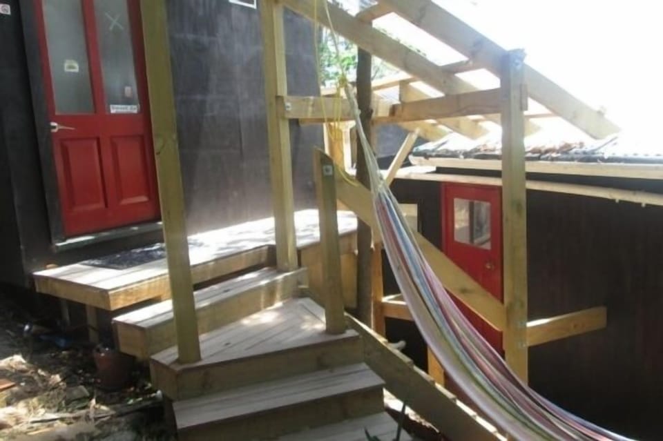 Sleepout/back of main House