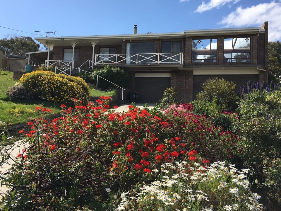 2 Bedrooms on left, living room centre, Sun room / living room on right