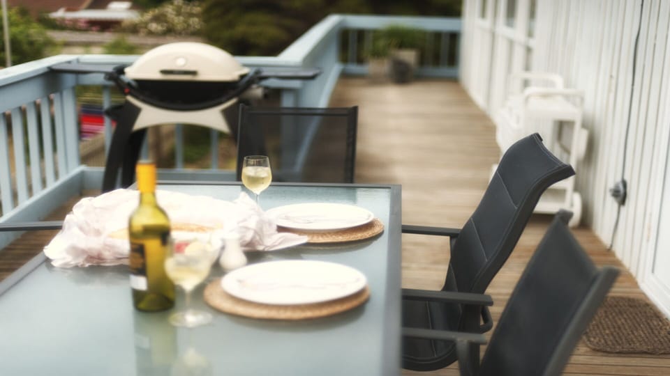 Extensive deck with Weber BBQ.