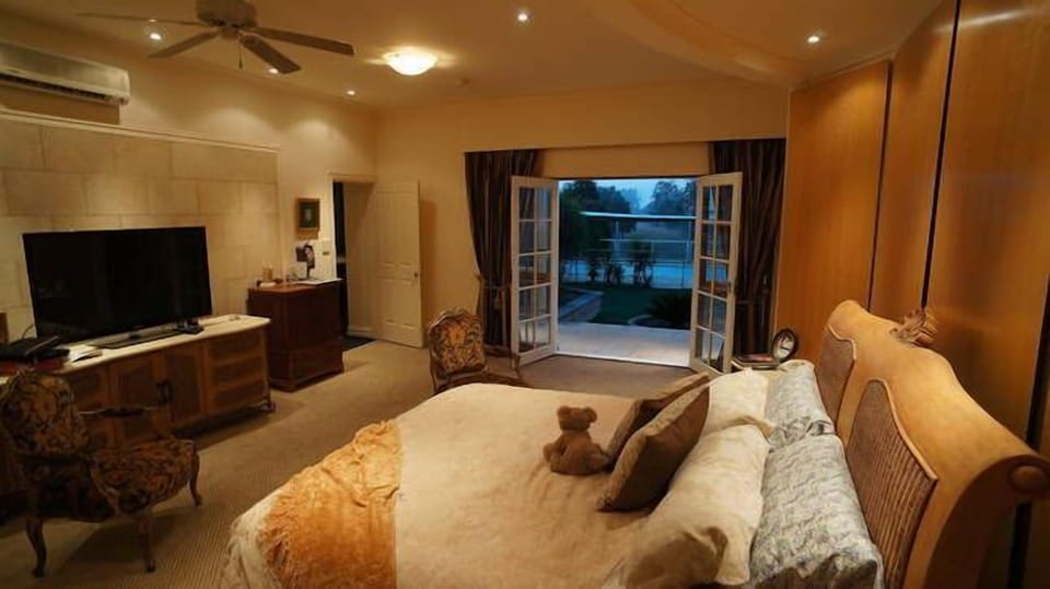 Executive suite looking through to cabana and pool