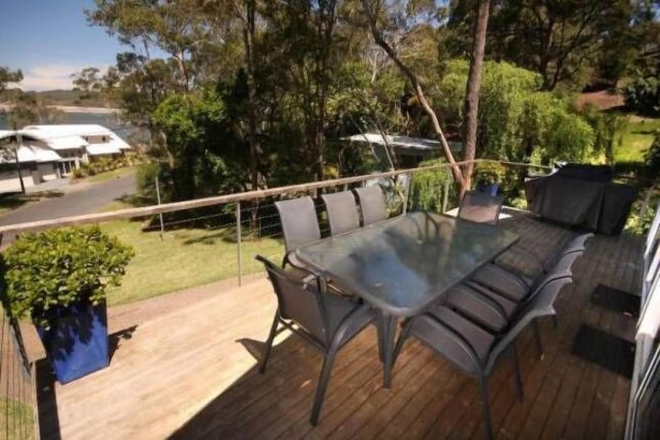 8 seater outdoor setting with Webber BBQ 