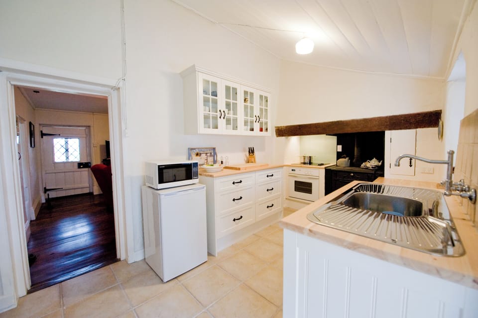 Full kitchen now with full size fridge. 