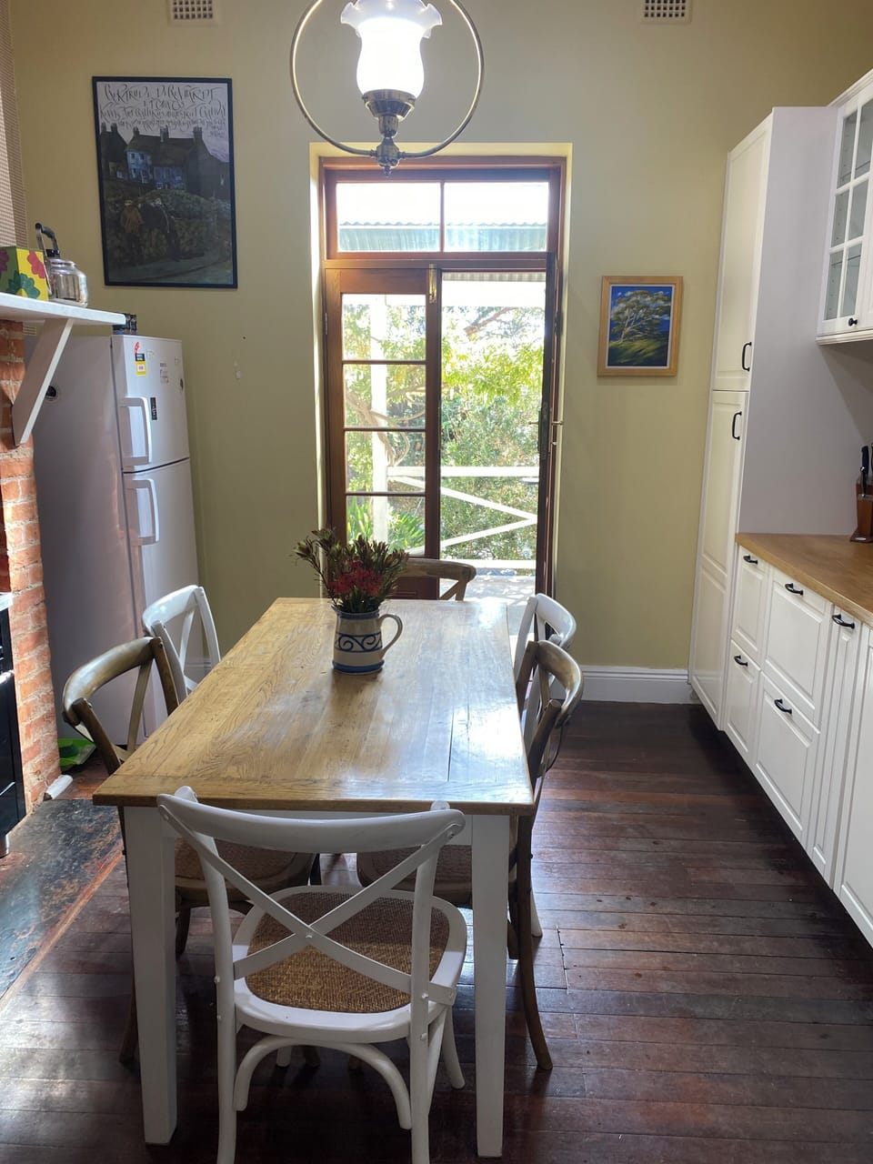 Eat-in country kitchen , French doors to verandah and outdoor dining.