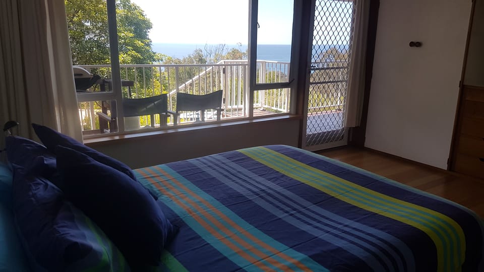 Check out the sea view from bed
