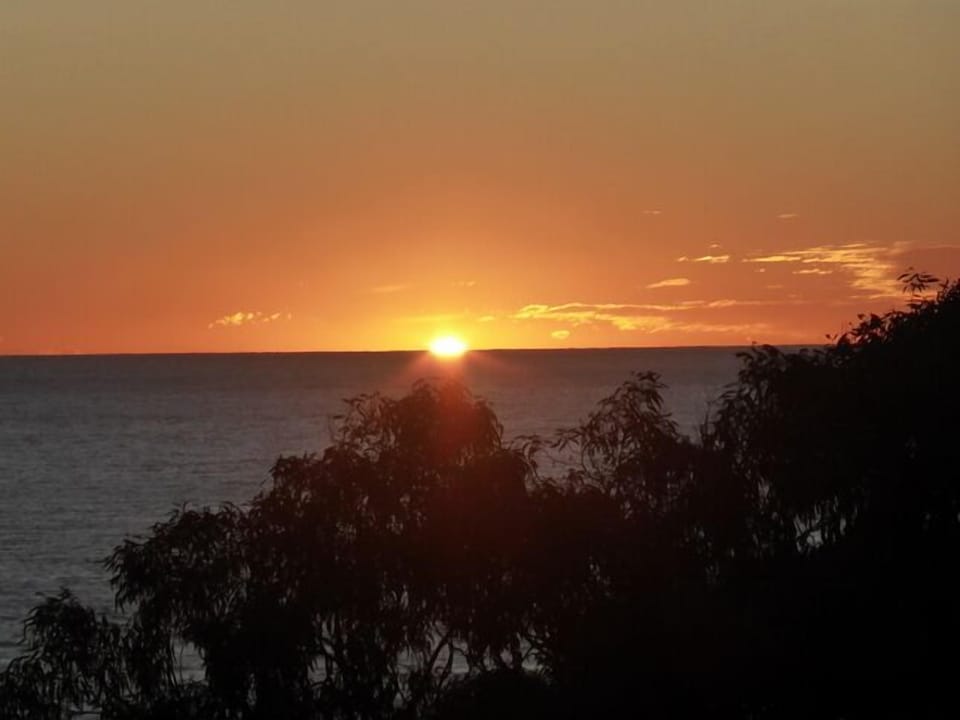 First rays of light over the sea
