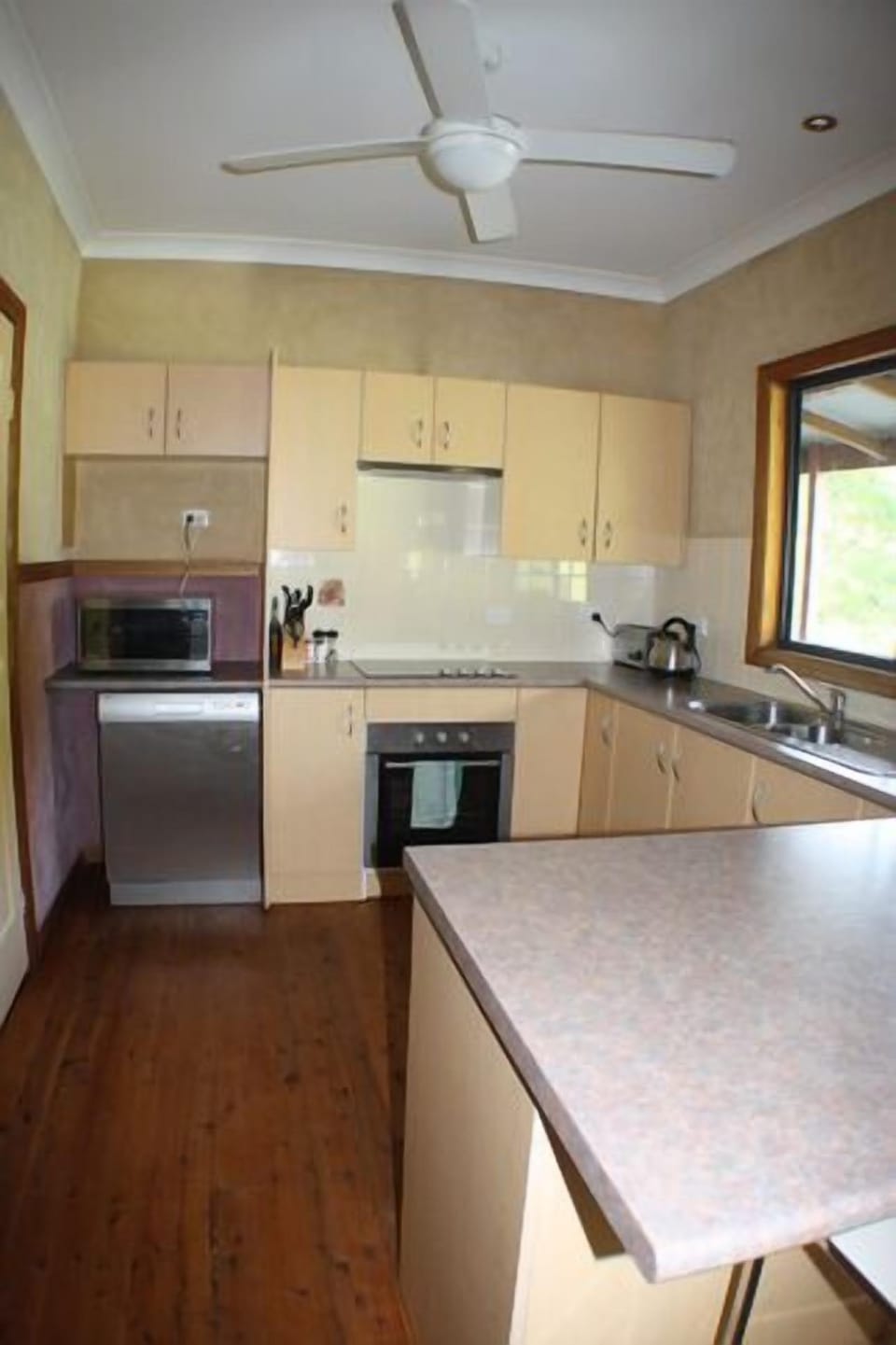 A practical and well equipped kitchen.