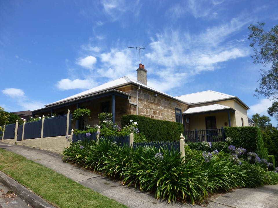 property from the street. Studio entrance is down the driveway