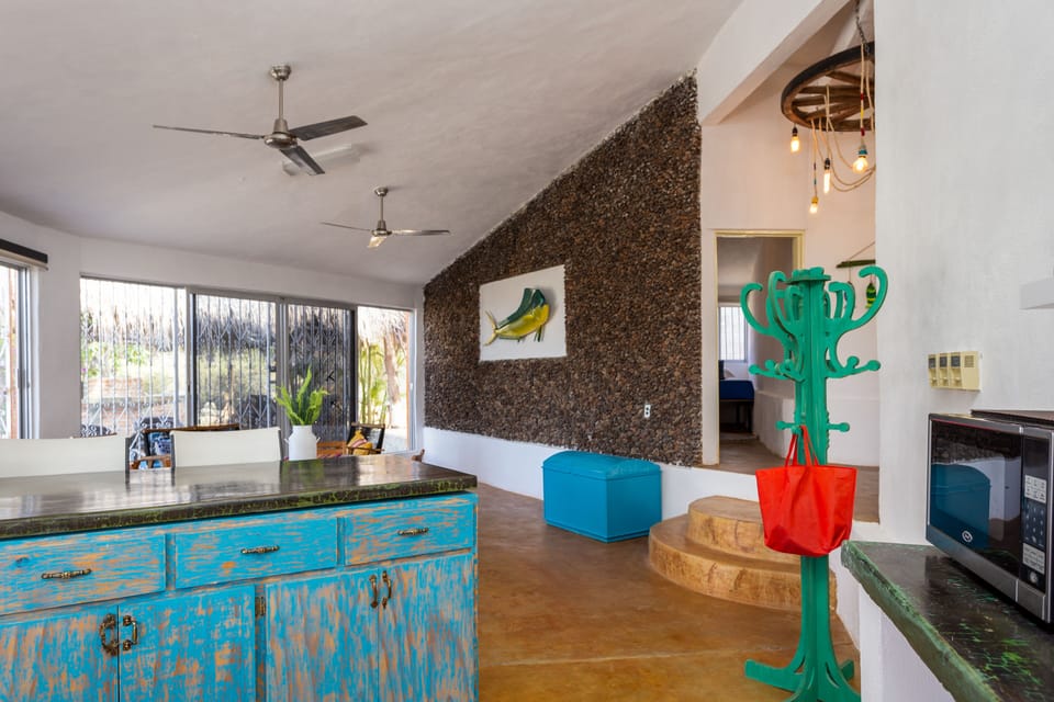 Living room and kitchen area, the kitchen is open and spacious.