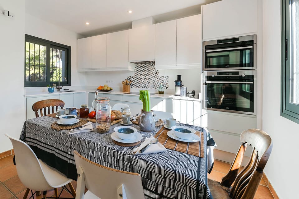 New kitchen complete with kitchen gadgets, cookery books and wine cooler.
