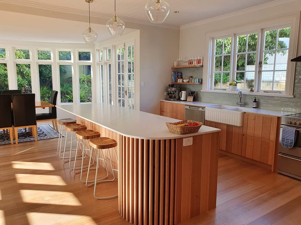 Well equipped kitchen with marble bench top and quality appliances