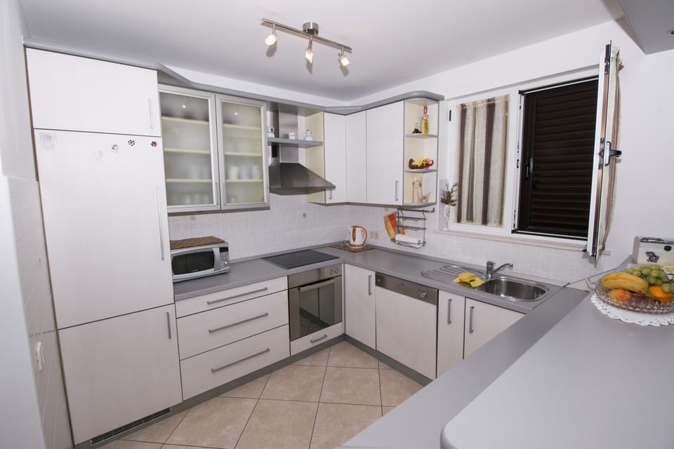 Kitchen is well equipped and has everything you need for cooking. 