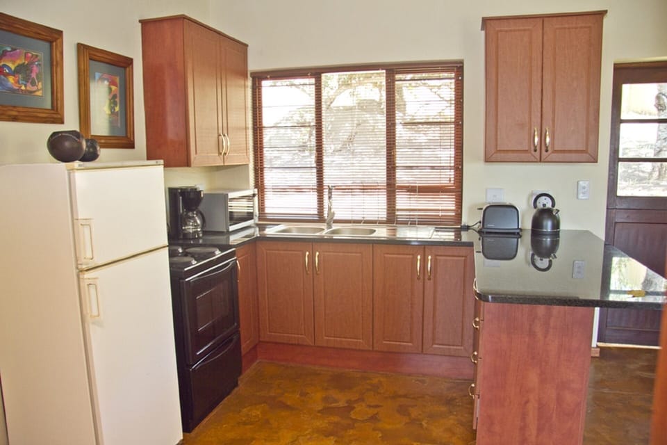 Modern kitchen with all amenities.