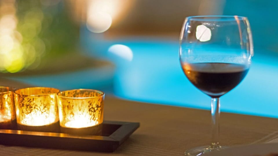 After a demanding day, a glass of wine by the pool can definitely be refreshing