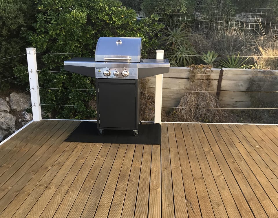 Enjoy BBQ food on rear deck.