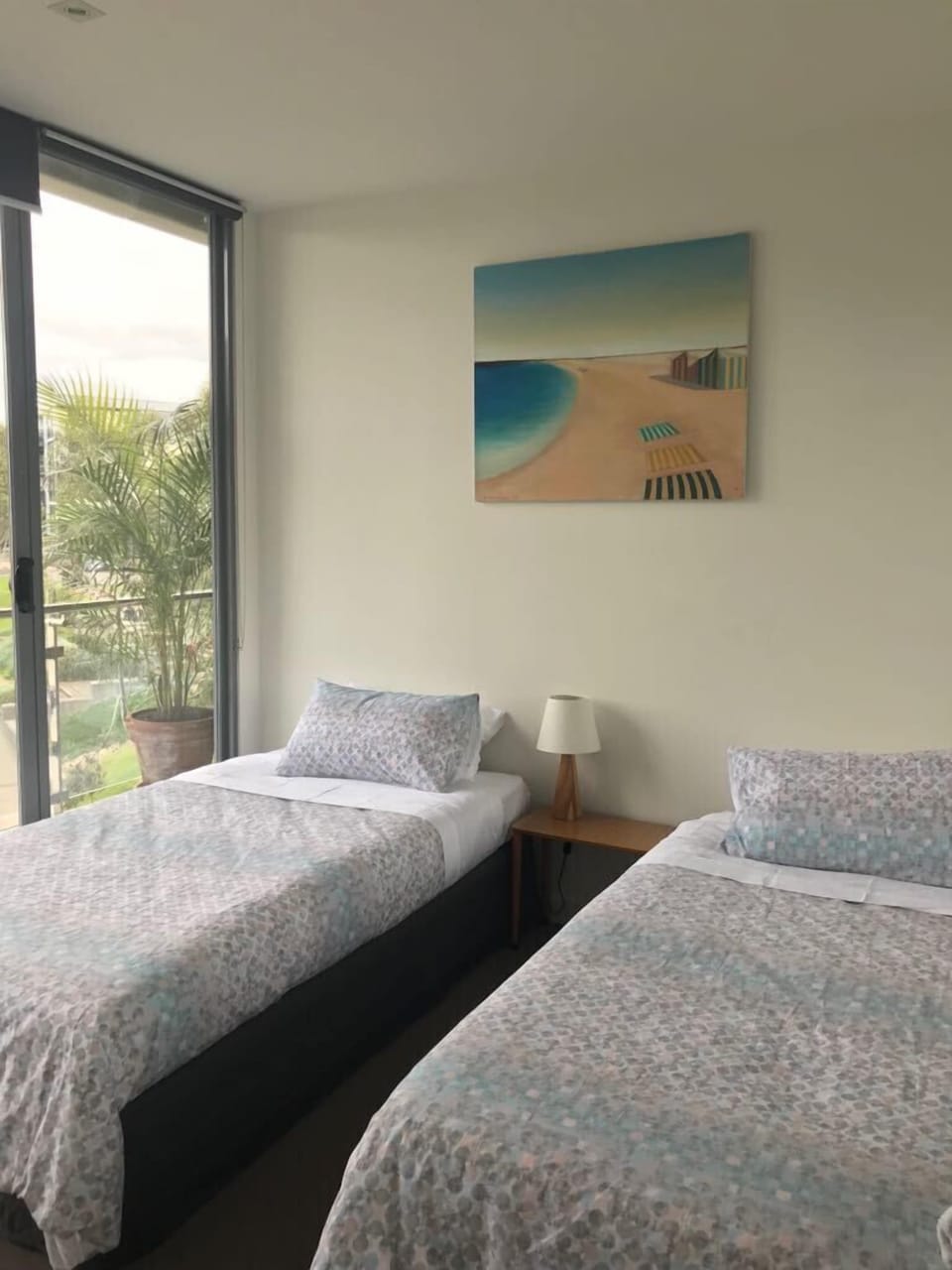 Second bedroom with balcony and marina views