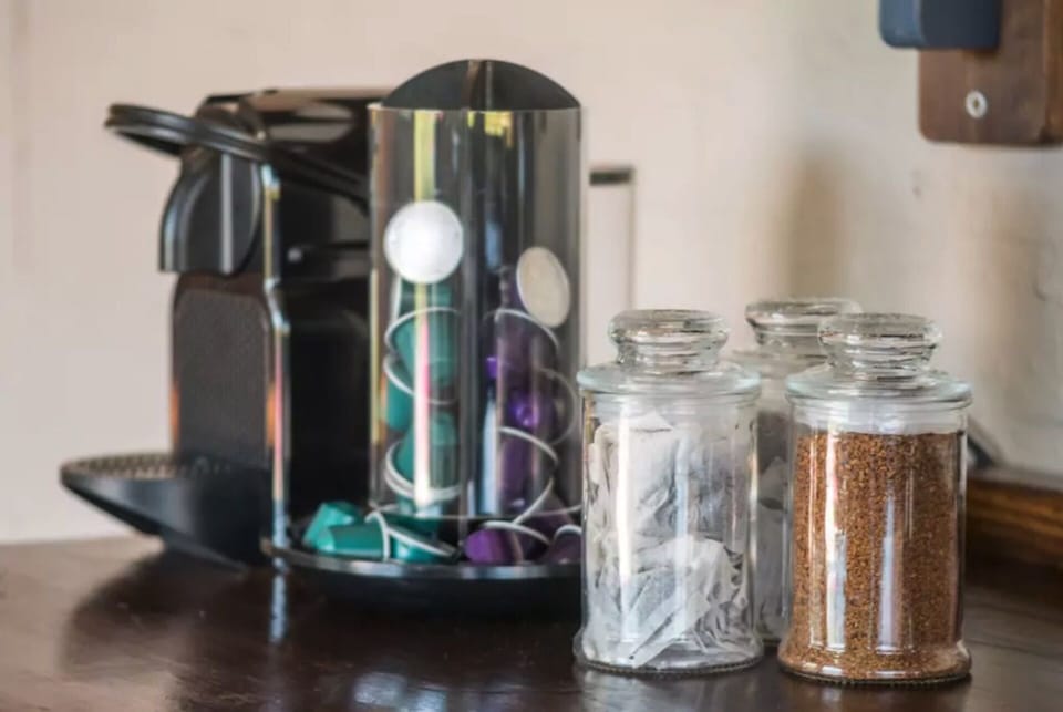 Coffee bar with Nespresso, instant coffee and variety of tea.