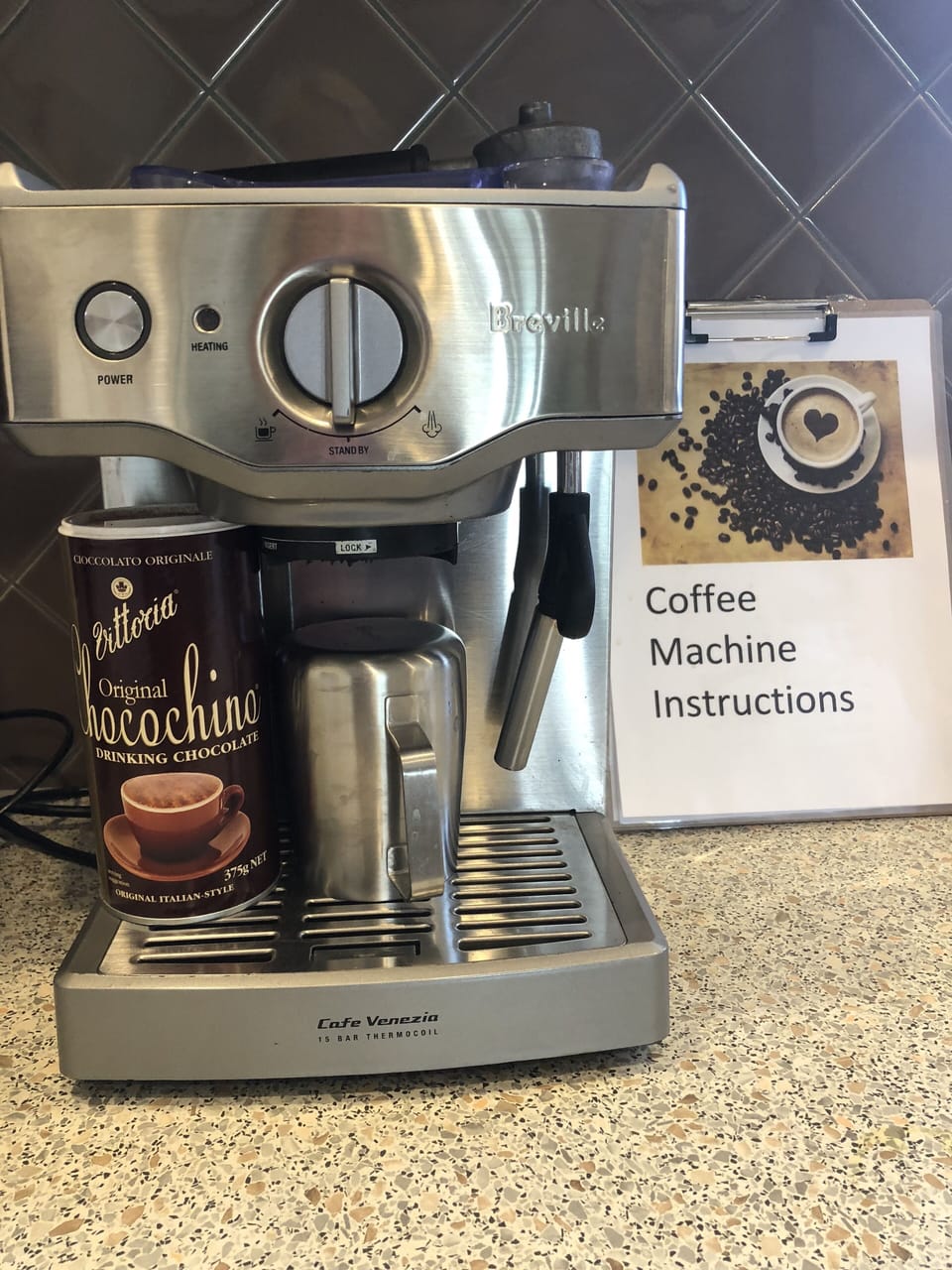 Coffee machine, beans & grinder are provided for your use