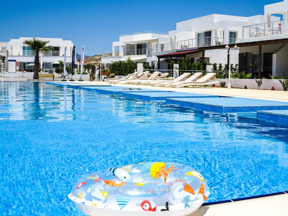 Communal pool steps away from the villa