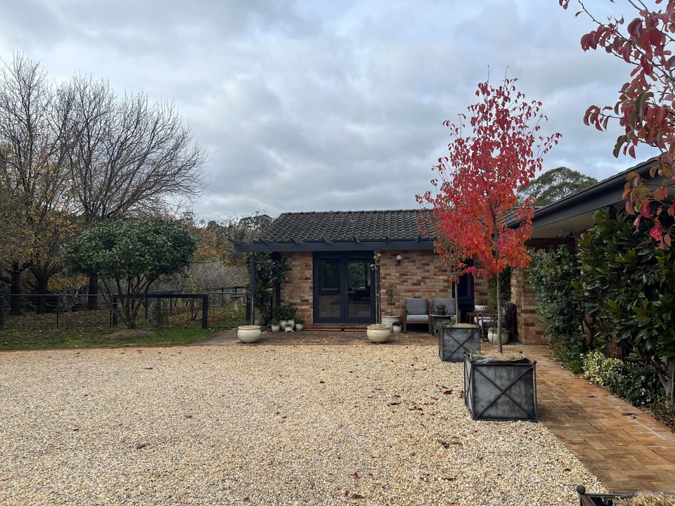 Front of house and parking area