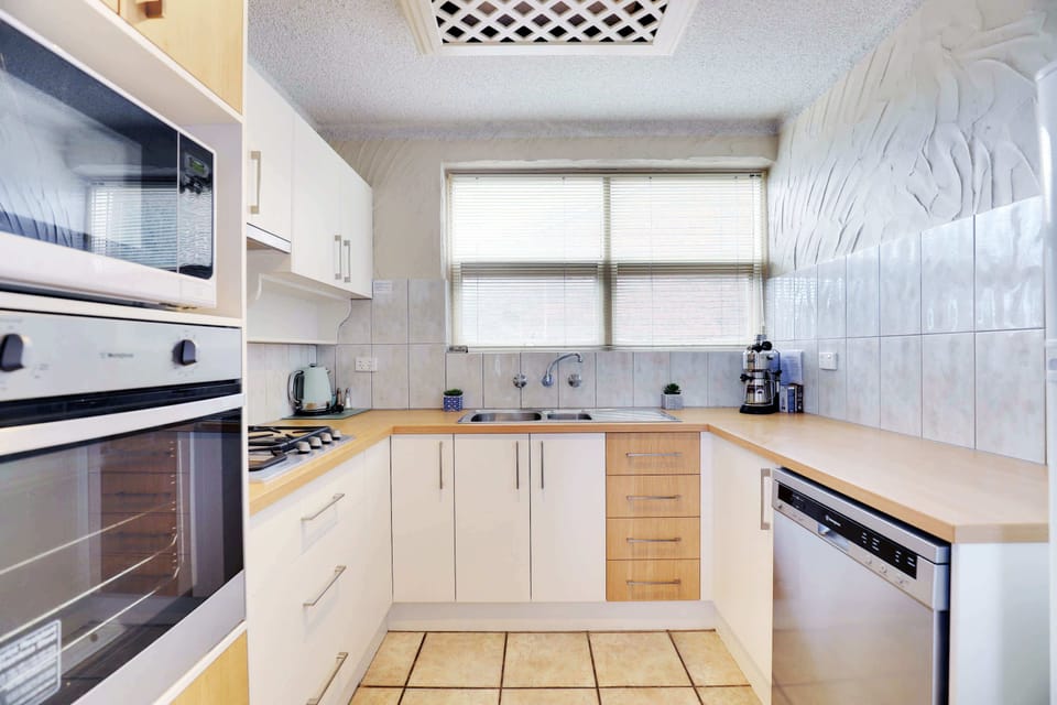 Get cooking in this newly renovated (AUG17) kitchen featuring gas stove/oven, fridge, microwave, kettle, toaster & dishwasher.
