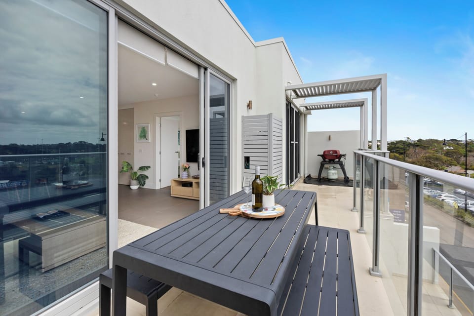 Balcony with outdoor dining & BBQ