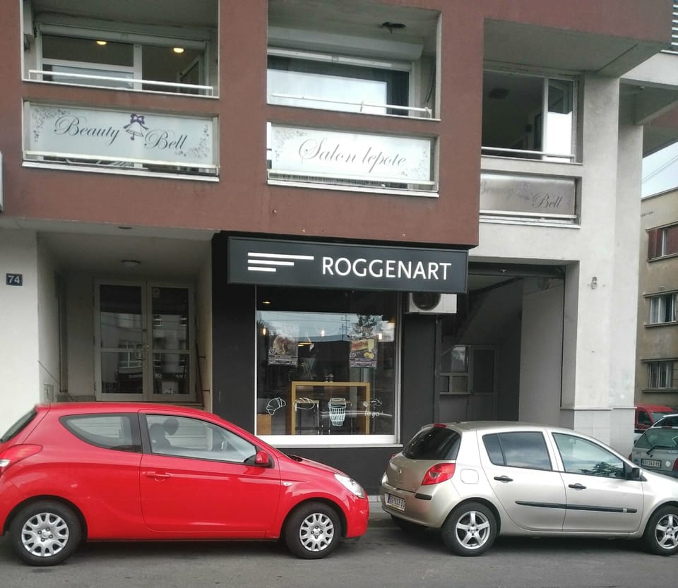 coffee shop, bank and beauty salon in the building