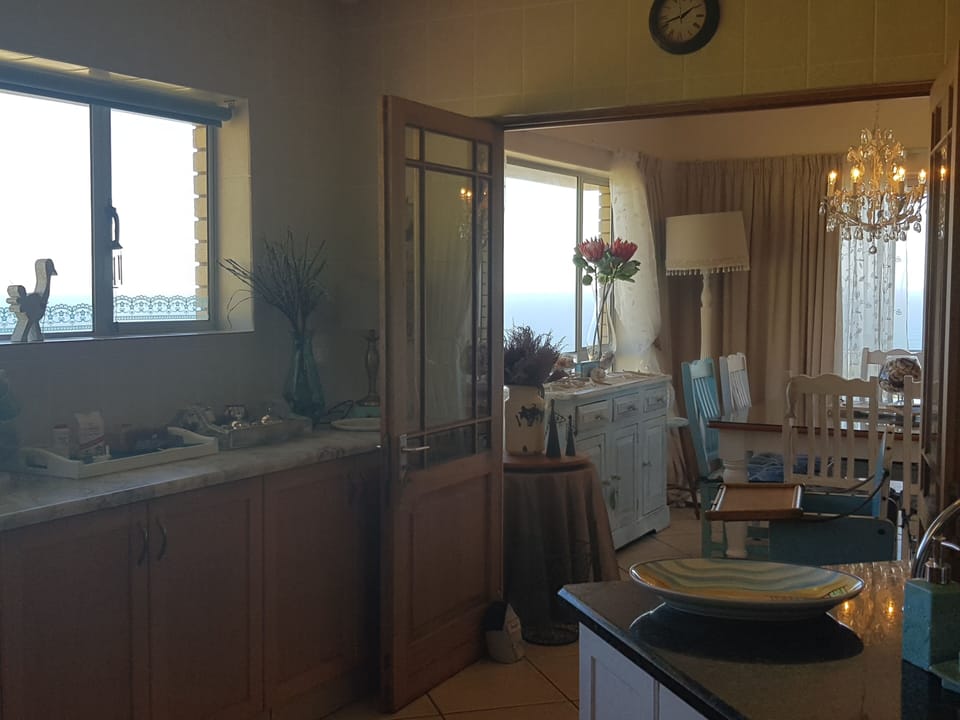 View from the kitchen / one can see the dining room / 180 degree sea view