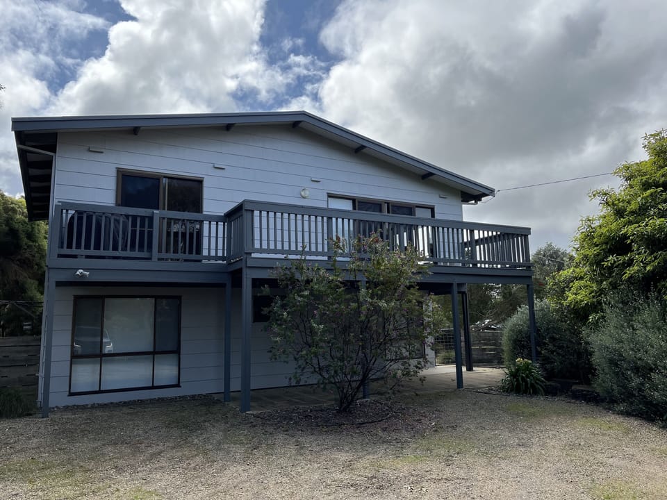 Front of house with off street parking for 3 cars