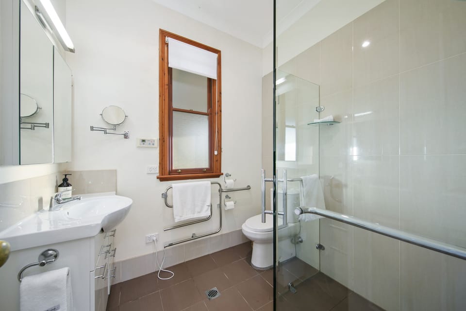 Ensuite with shower, toilet and vanity