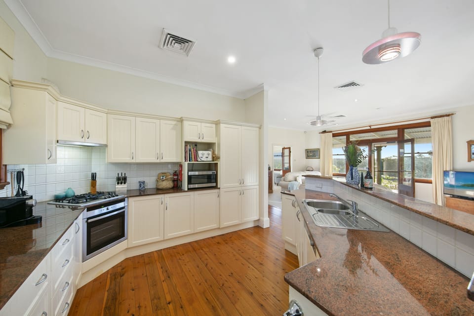 Fully equipped kitchen with gas cooking, dishwasher, microwave & full oven