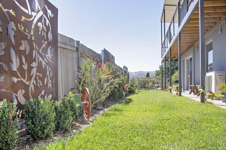 Lounge accesses this north garden, which may be shared with studio guests.