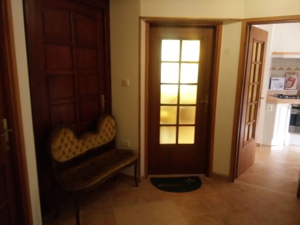 Part of the hallway at the entrance to the living room / room, kitchen and bathroom