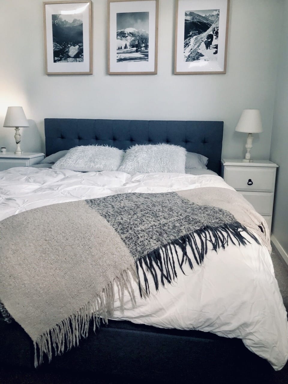 BEDROOM BLISS! A big queen bed to rest after a big day, with storage drawers. 