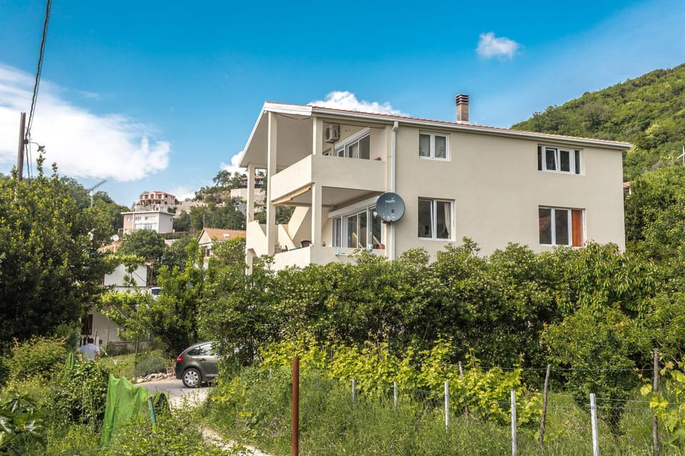 Exterior building is new and the road to the property is paved and narrow. 