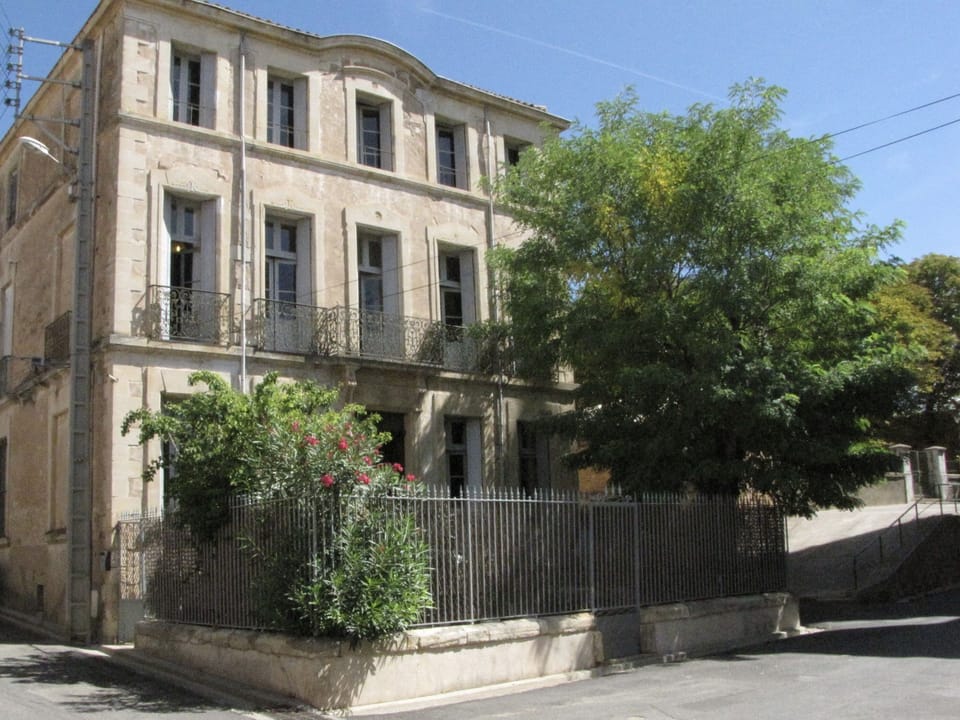 The front of the house situated in a small square behind the church (image 2)