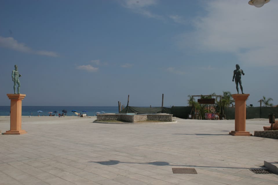 Riace Bronze statues on promenade