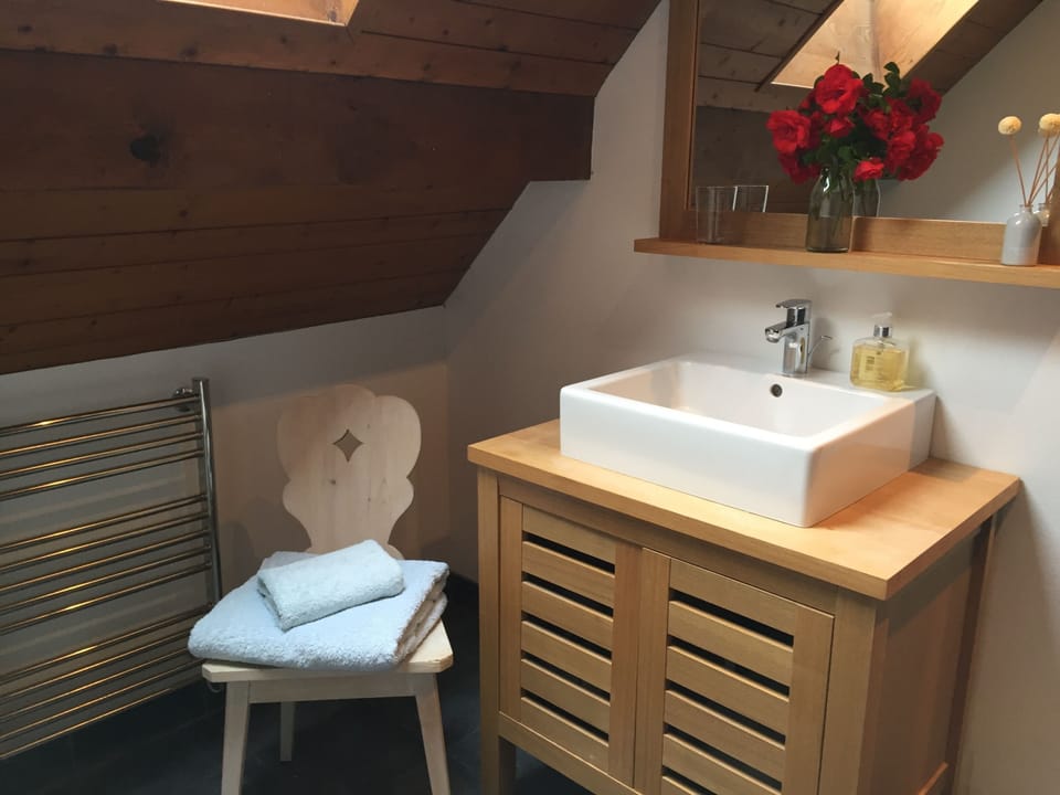 Bathroom with heated towel rail