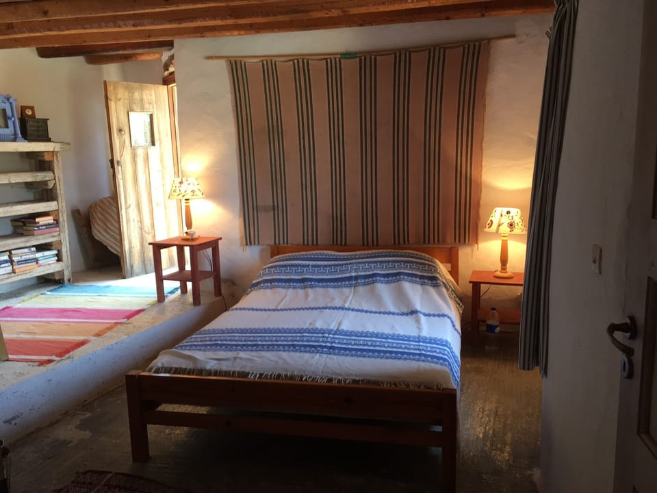 Master bedroom in the adjoining part of the house 