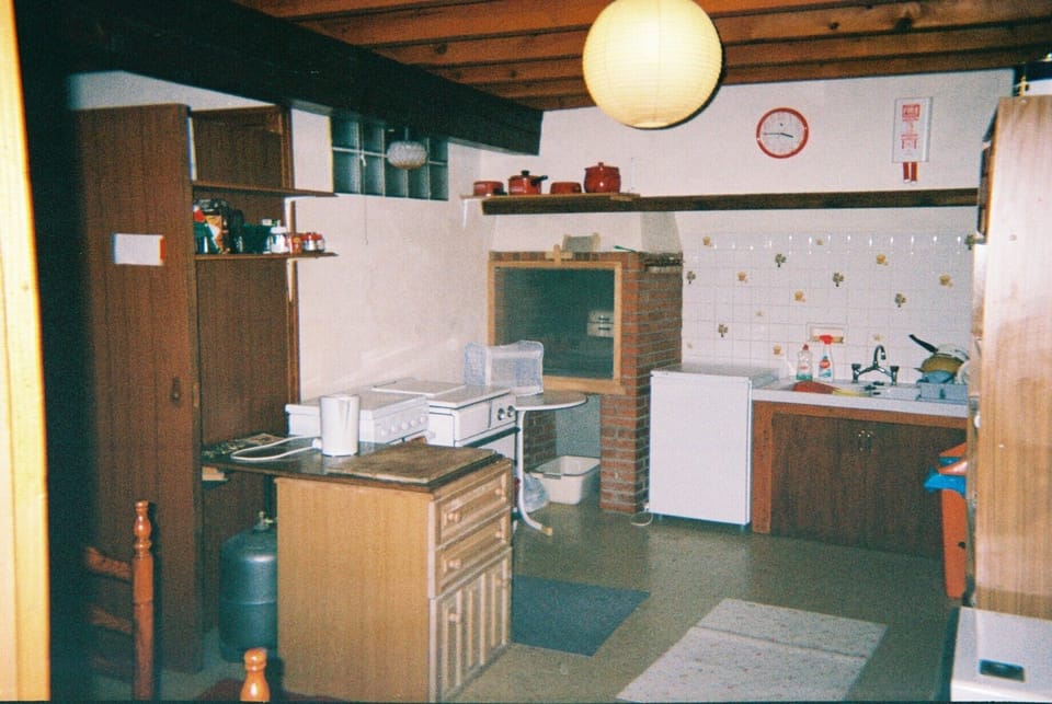 Kitchen. Cooker, fridge, microwave etc. Dining area just out of shot to the left