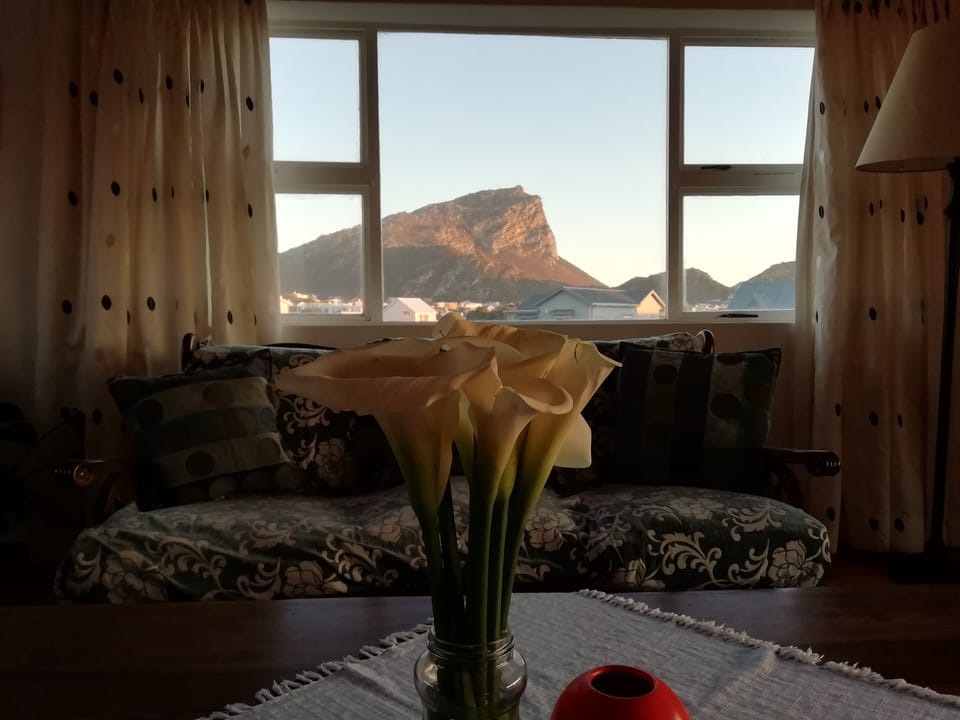 Spacious living room with mountain views. 