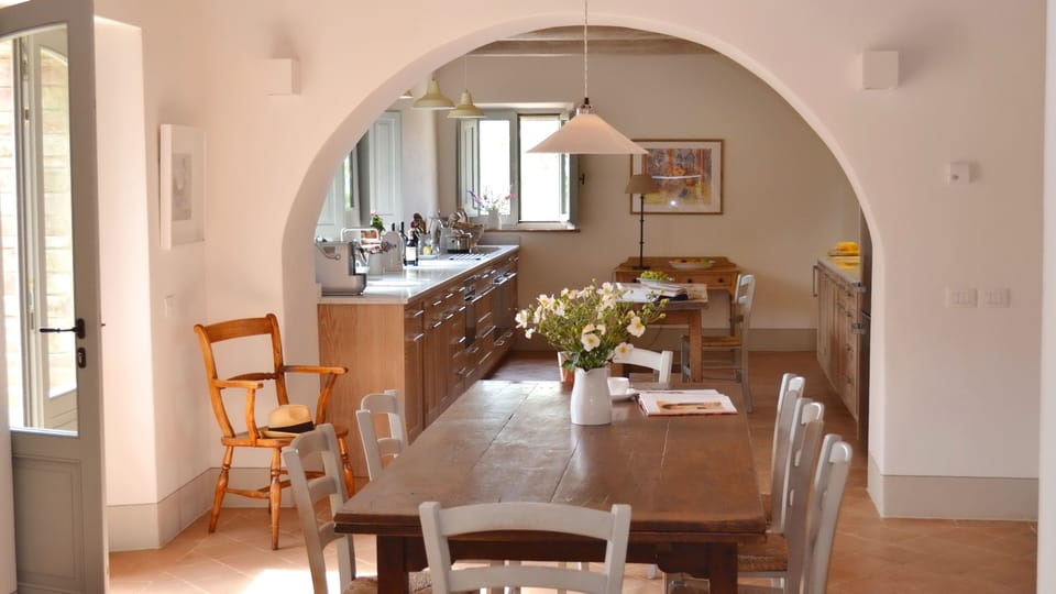 Dining room leading to kitchen