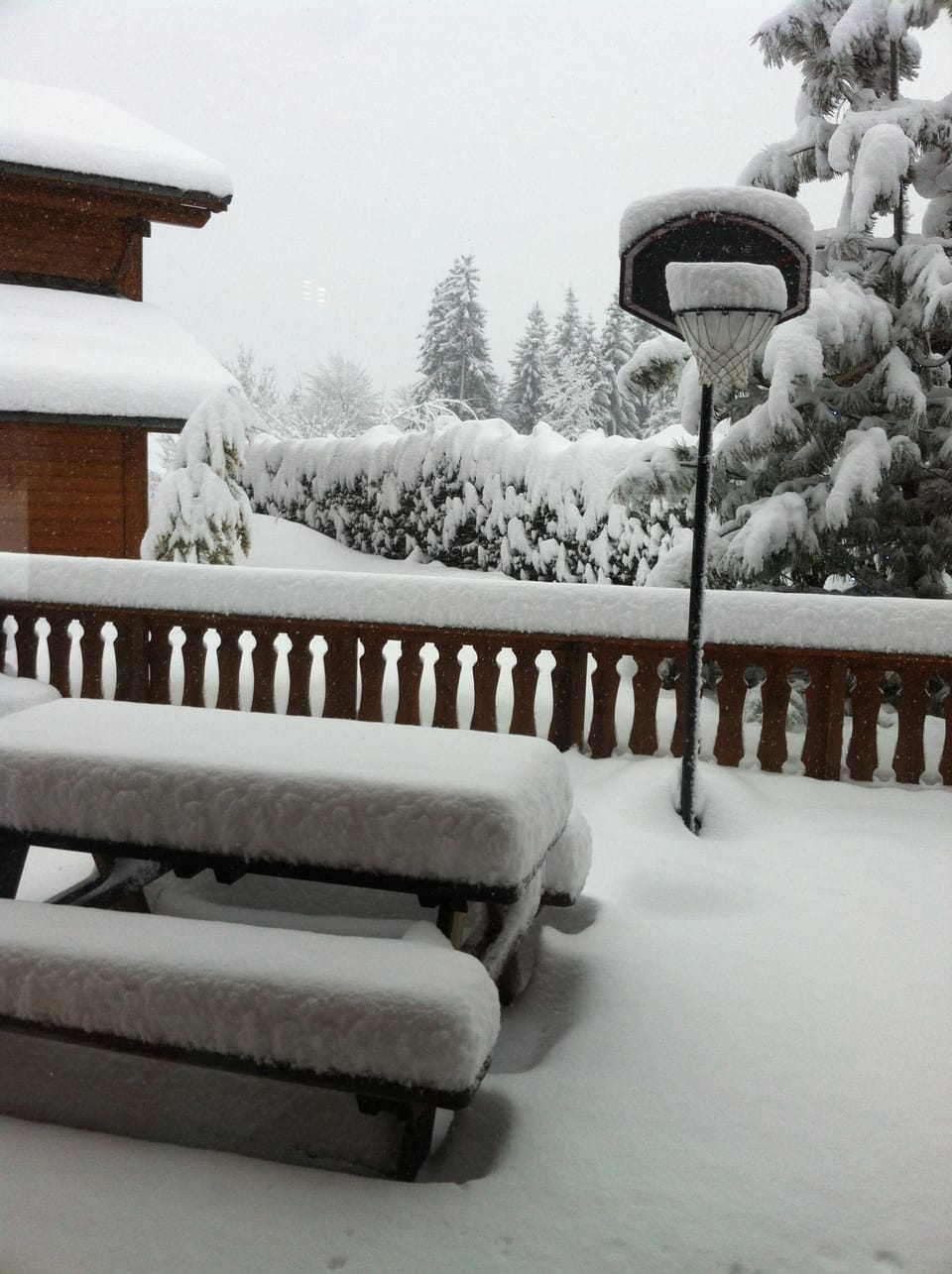 Chalet Bleu terrace covered in snow
