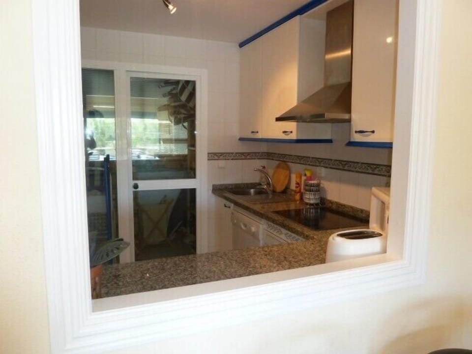 View fully equipped kitchen