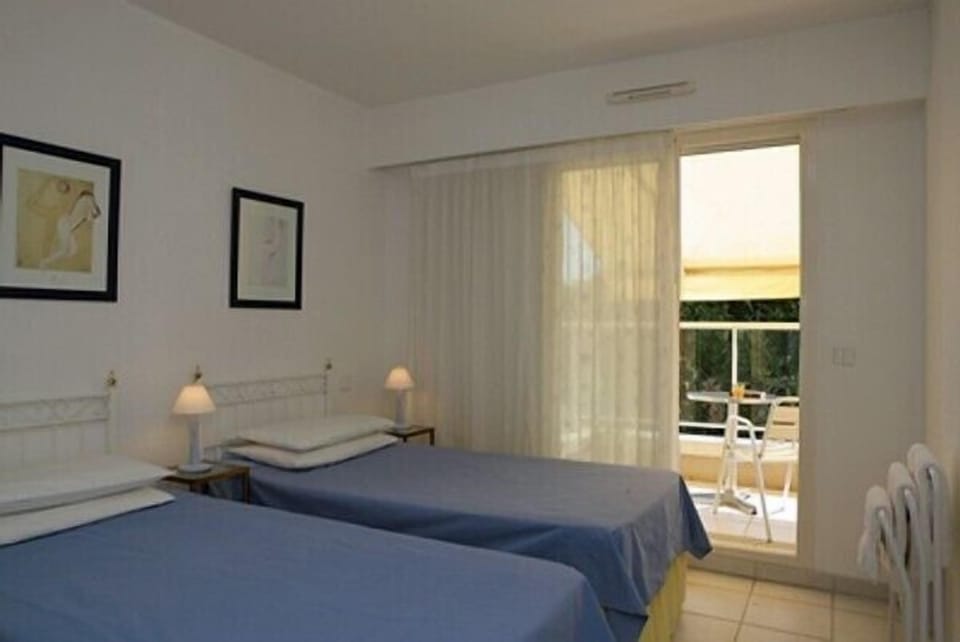 Bedroom looking to balcony