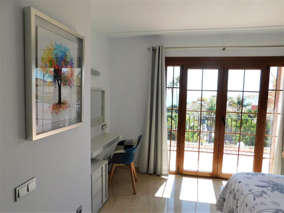 Master bedroom dressing area and balcony