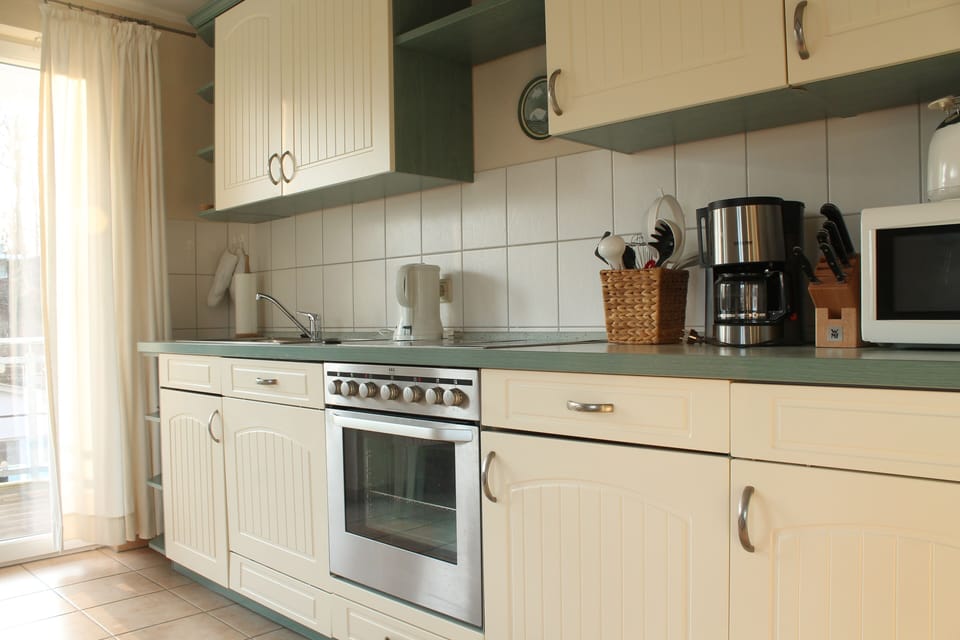 The modern fitted kitchen has all the necessities